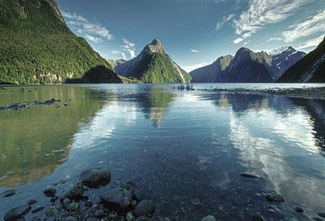 Looking up Milford Sound past Mitre Peak (1683m) centre. Mt Pembroke (2000m) in snow - right. Fiordland National Park, Southland Dist., NZ