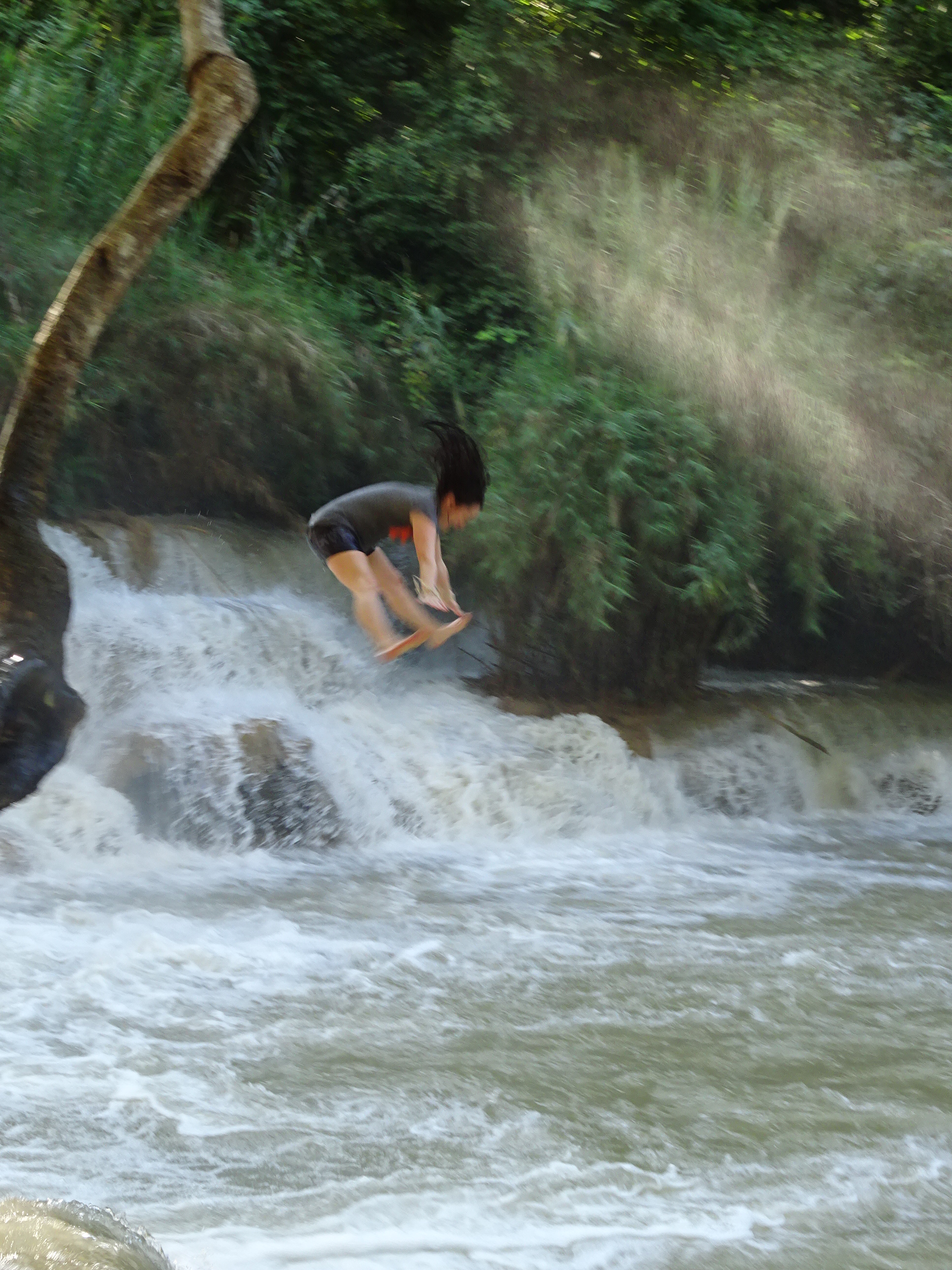 Sometimes the best things happen outside your comfort zone. Me jumping off a tree branch into a fresh water waterfall in Laos!