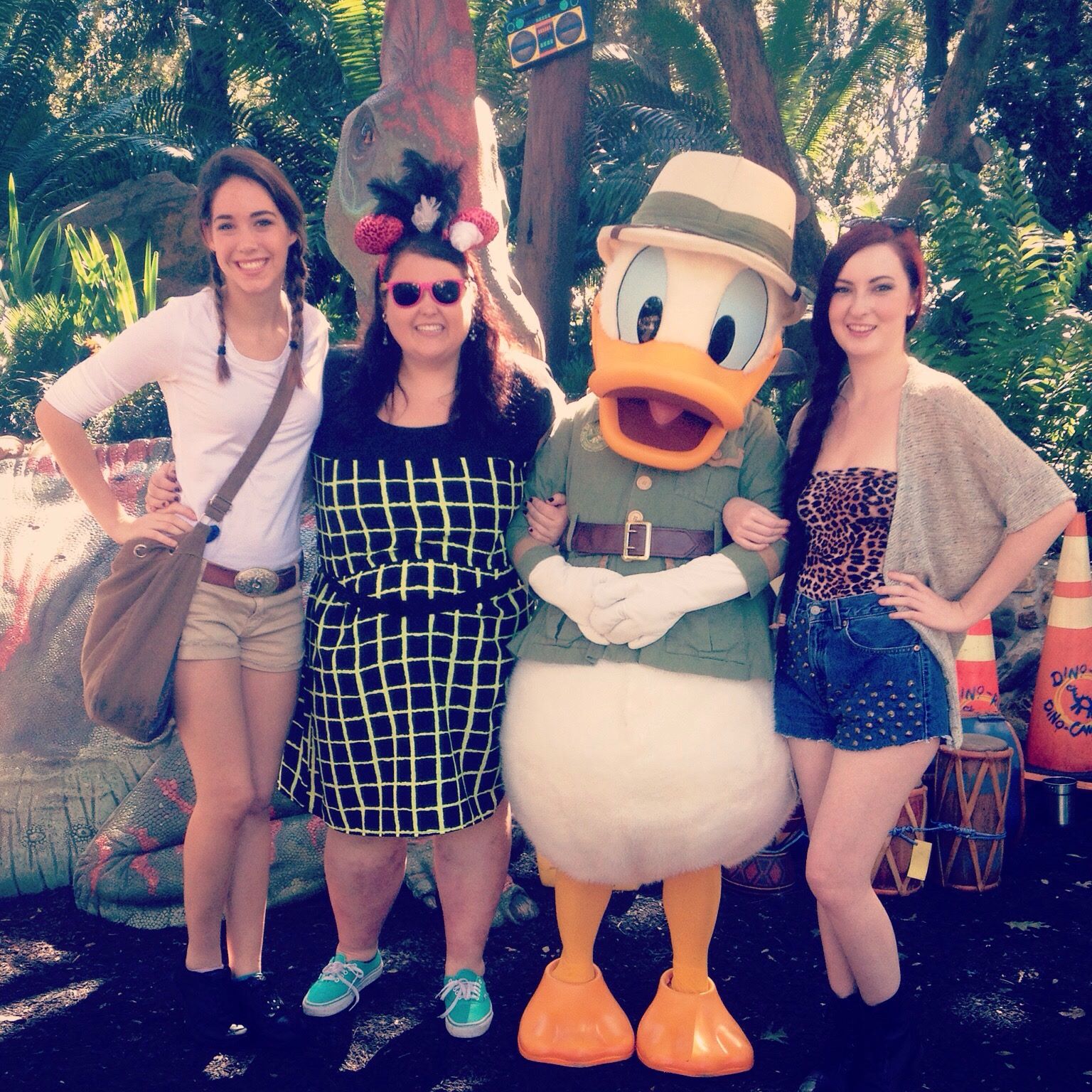 Jordana Grace (in the green and black dress) with friends and Donald Duck at Disney World, Orlando