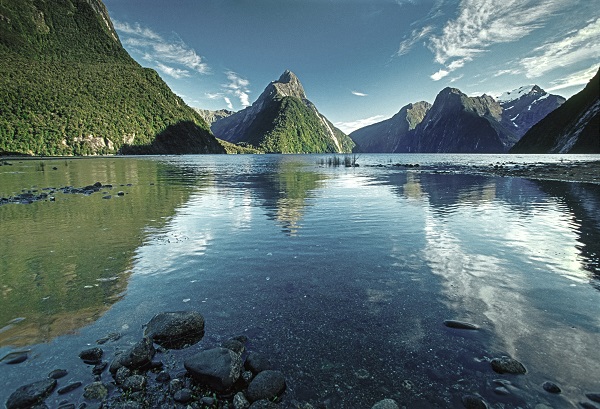 22579TS53-Looking up Milford Sound past Mitre Peak (1683m) centre. Mt Pembroke (2000m) in snow - right. Fiordland National Park, Southland Dist., NZ