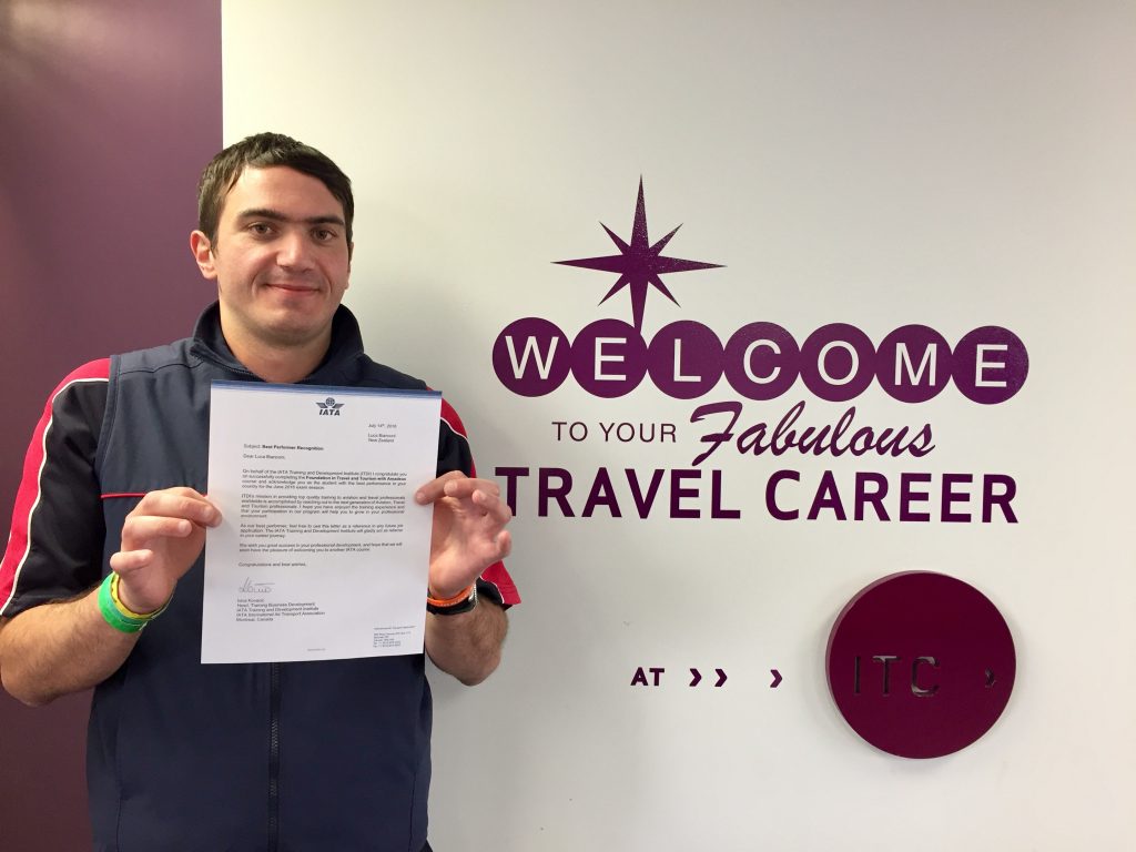 Luca Bianconi, an international student from Italy, holds the letter informing him of his outstanding IATA results.